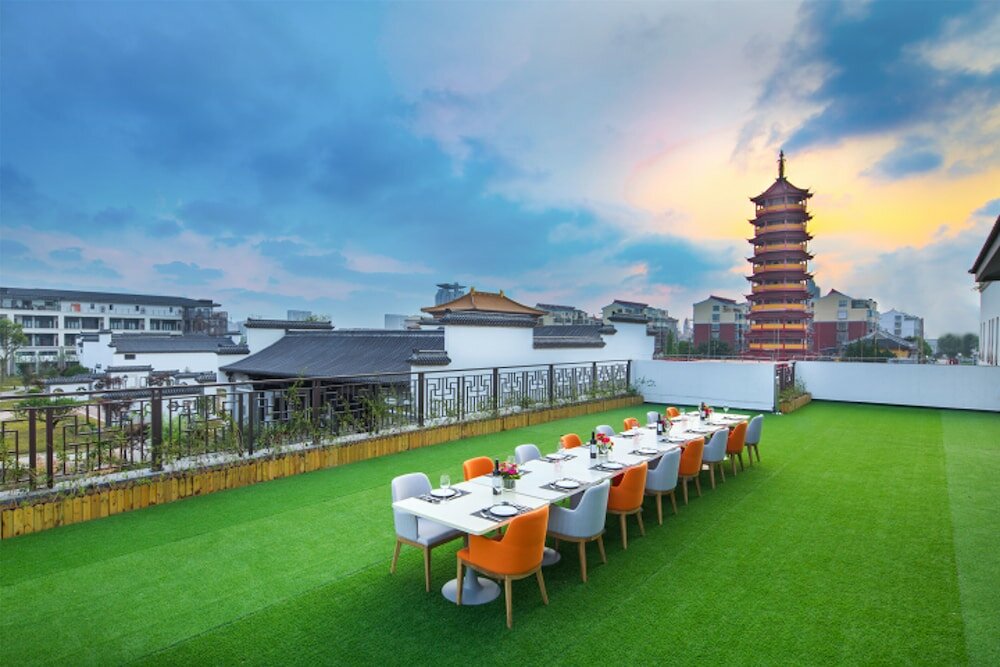 Фото Hilton Garden Inn Qidong