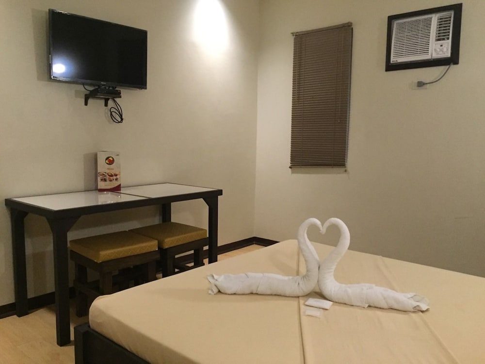 Фото Asiatel Hotel, Sta. Rosa, Laguna