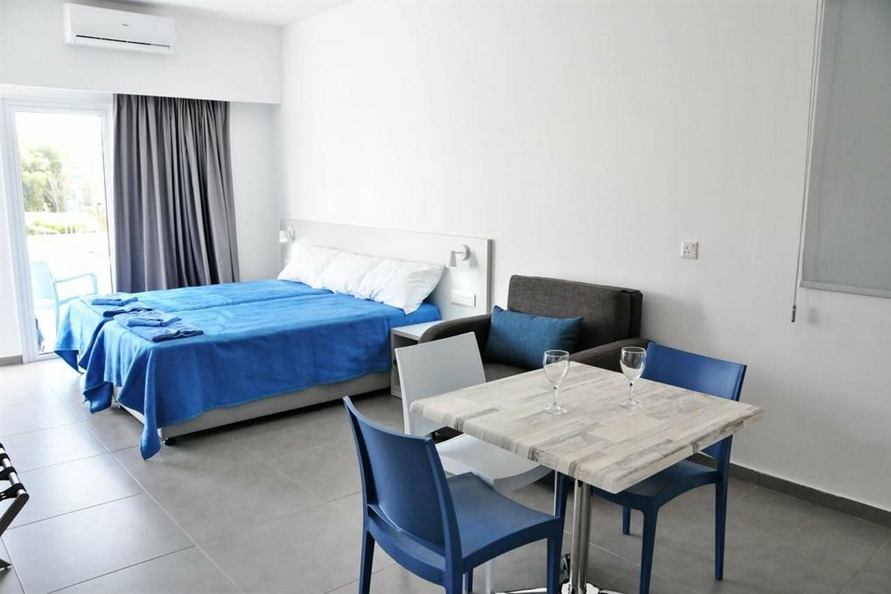 Фото Kaos Hotel Apartments