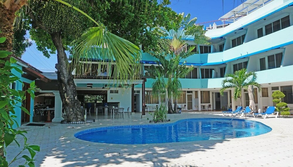 Фото New Garden Hotel