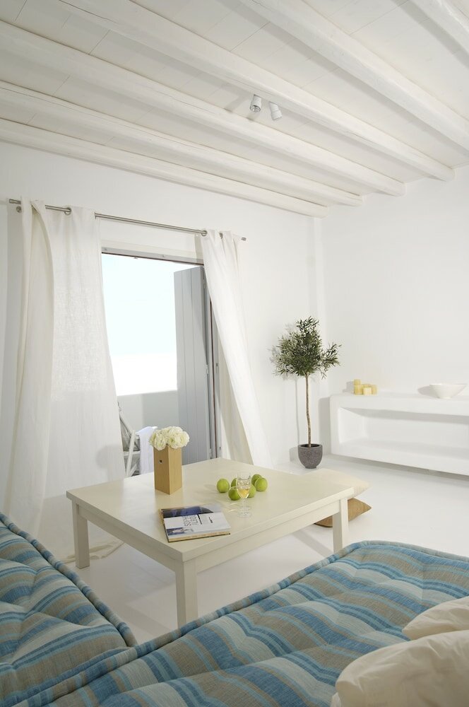 Фото Kapetan Tasos Suites