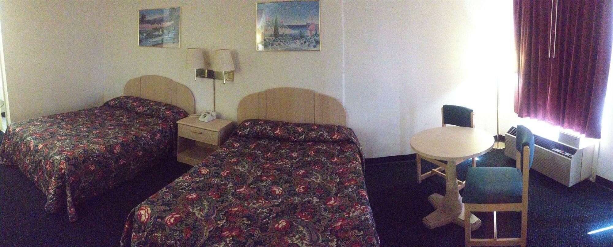 Фото Garden Inn & Suites