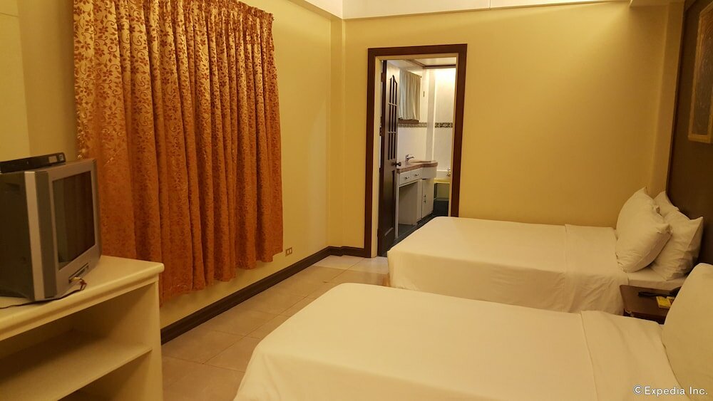 Фото Dumaguete Royal Suite Inn