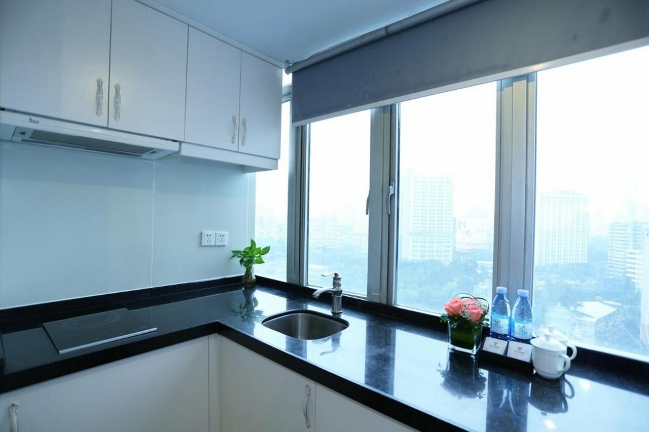 Фото Yihe Hotel Ouzhuang