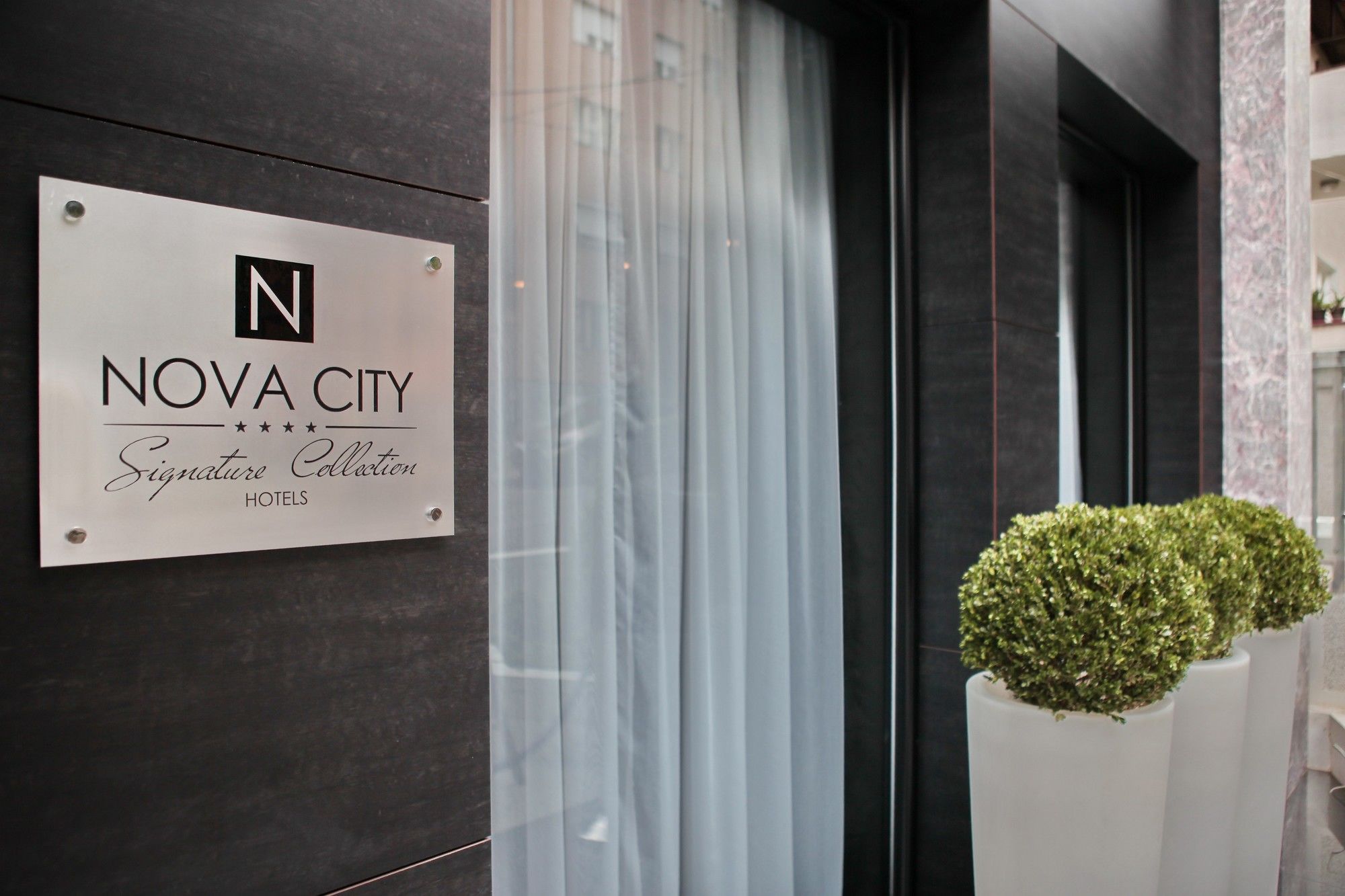 Фото Nova City Signature Collection Hotel
