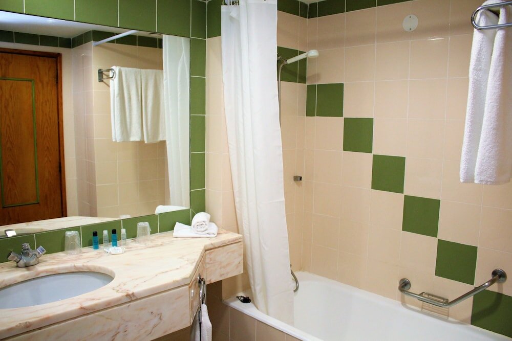 Фото Ourabay Hotel Apartamento