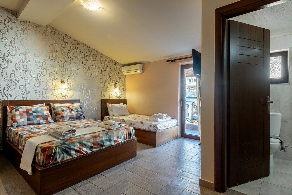 Фото Toti Boutique Rooms