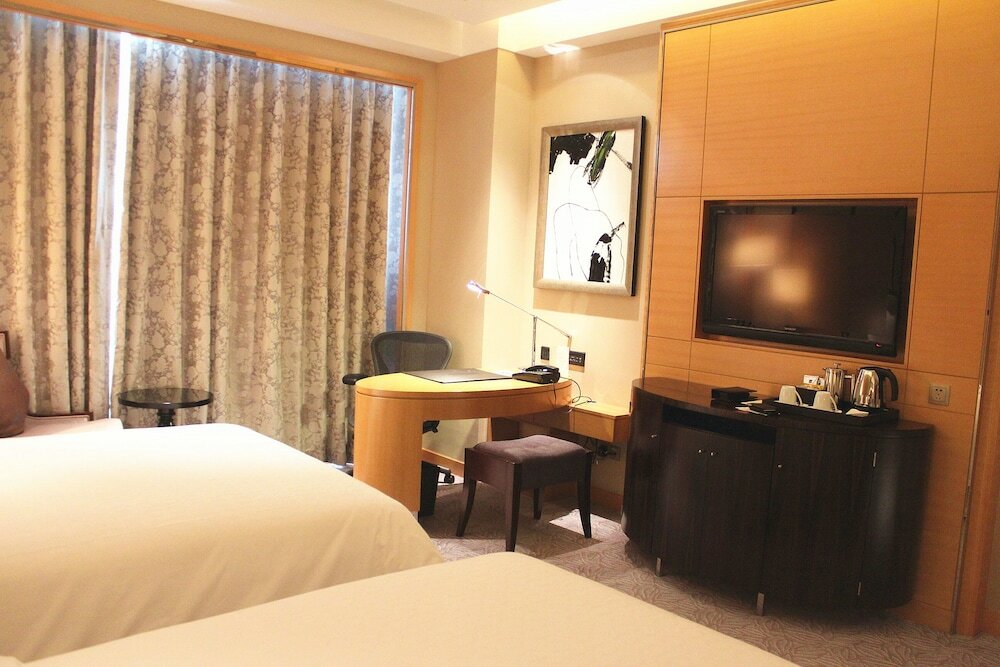 Фото Sheraton Qingdao Jiaozhou Hotel