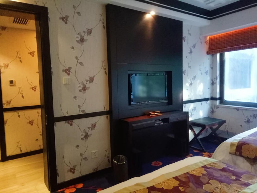 Фото Qiao Garden Vacation Hotel