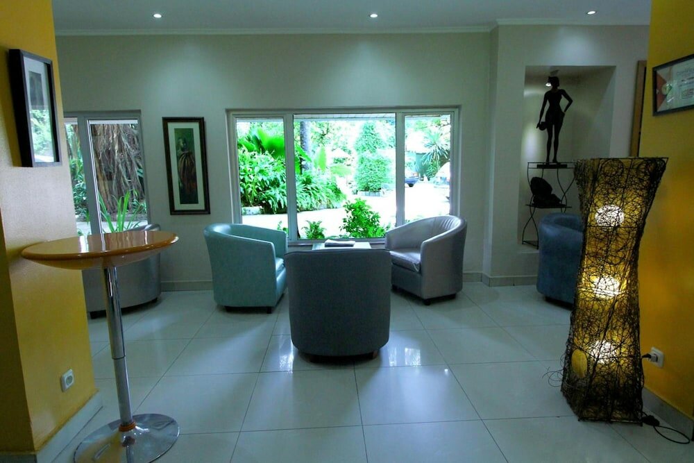 Фото La Cour Hotel Apartments