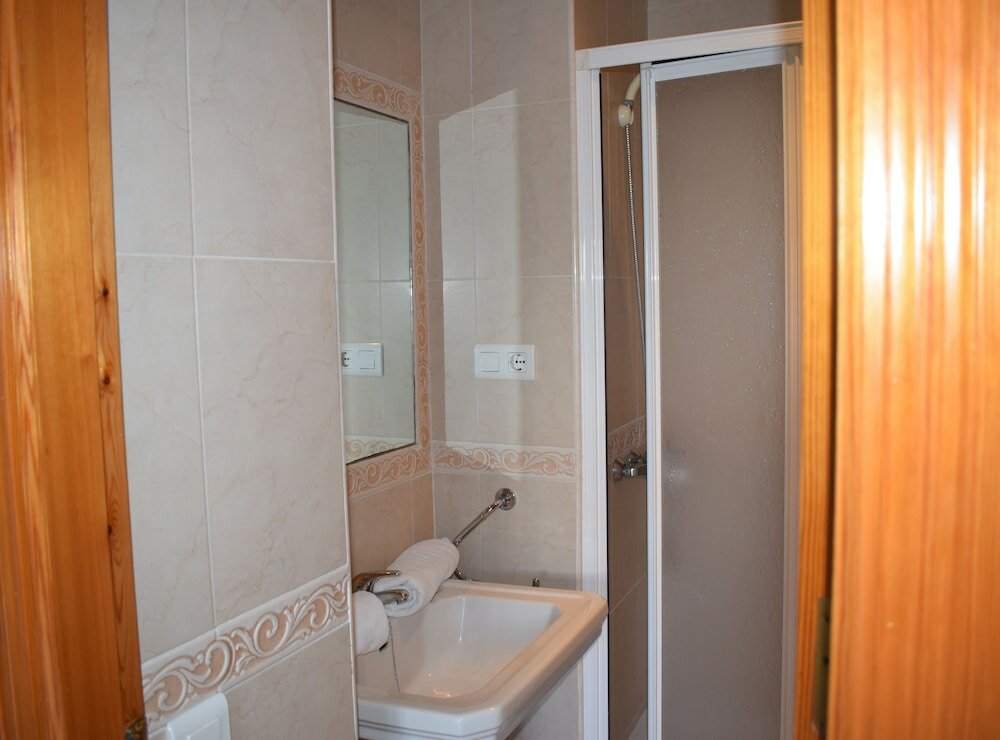 Фото Apartamentos El Jardin