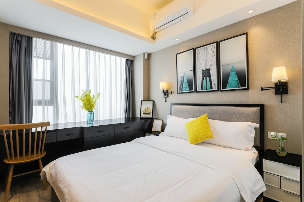 Фото Yue Qi Hotel Apartment