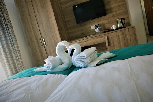 Гостиница TJ Boutique Accommodation