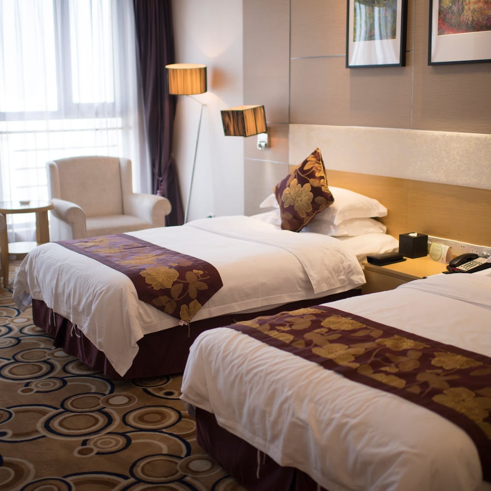 Фото Suzhou Sun Plaza Hotel