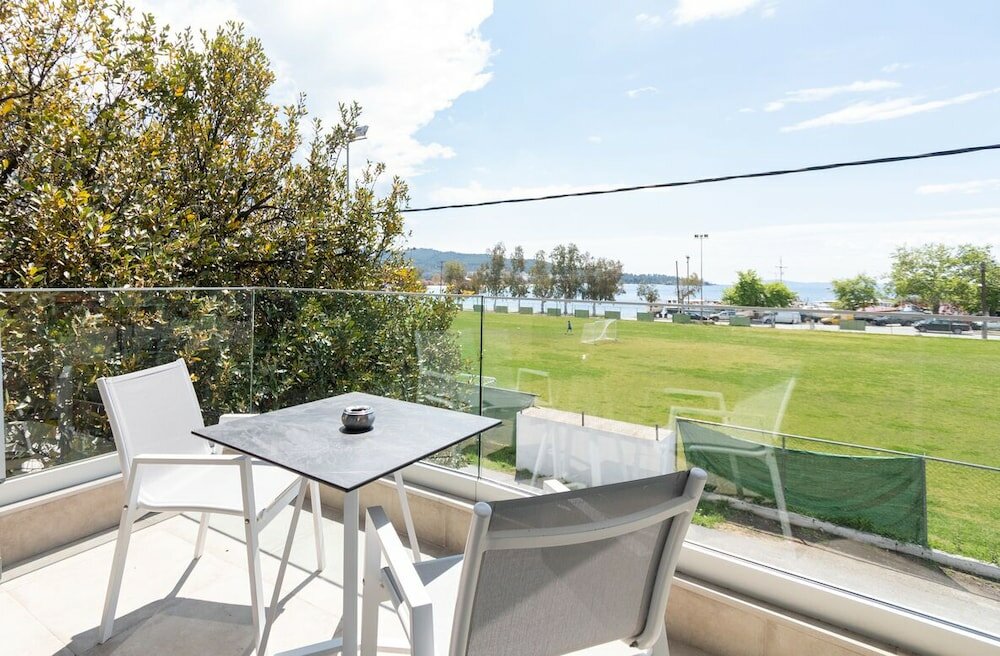 Фото Thetis Boutique Apartments