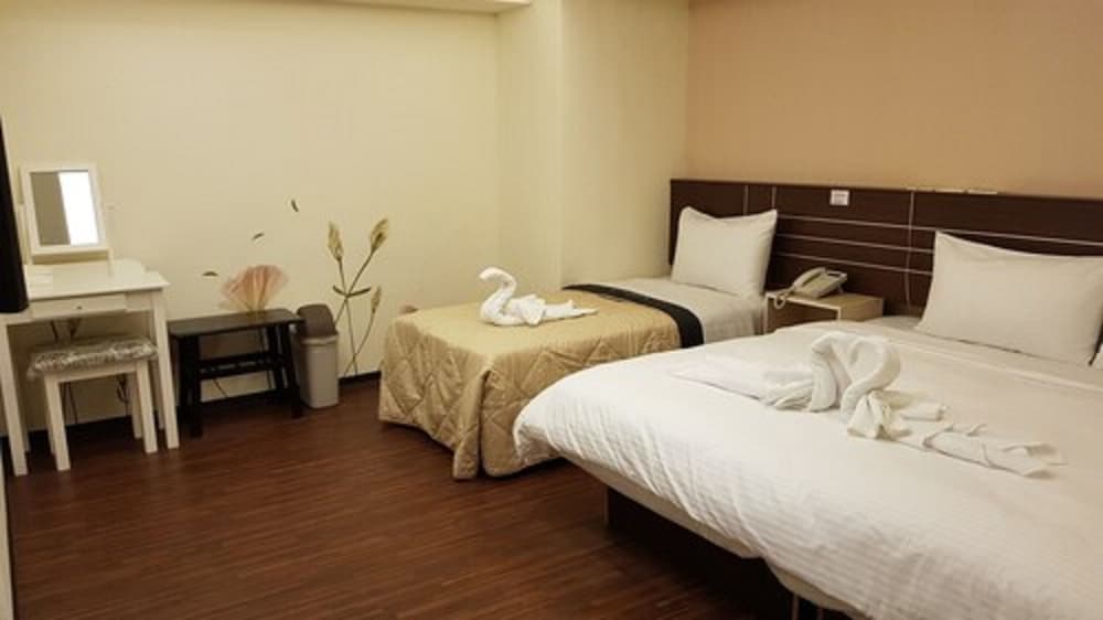 Фото Jhong-Sing Hotel