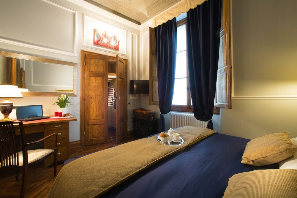 Фото Boutique B&b Torre De' Conti