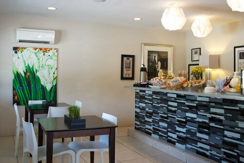 Гостиница Sole Inn and Suites в Пенсаколе