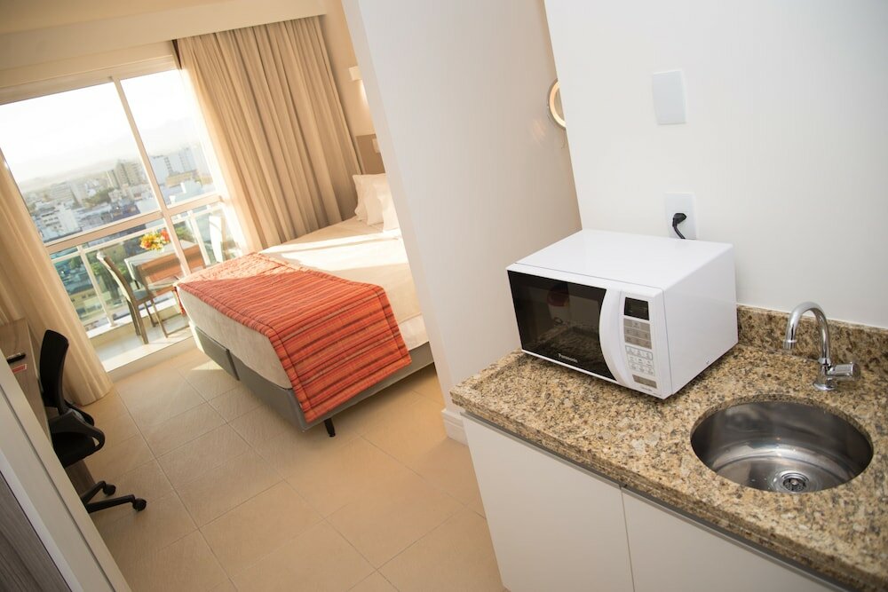 Фото Ramada by Wyndham Macae Hotel & Suites