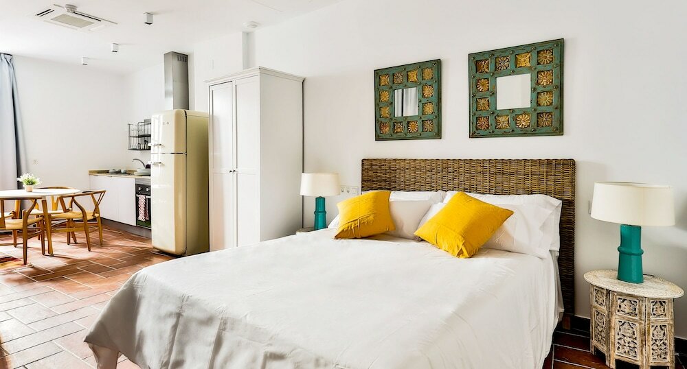 Фото Apartamentos Puerta Sevilla De Cordoba