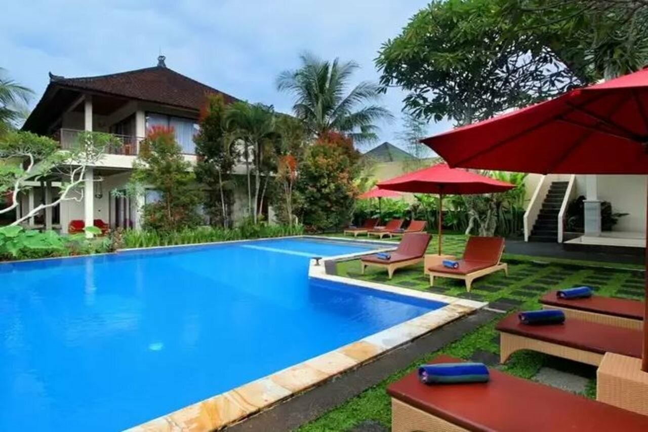 Фото Putri Ayu Cottages