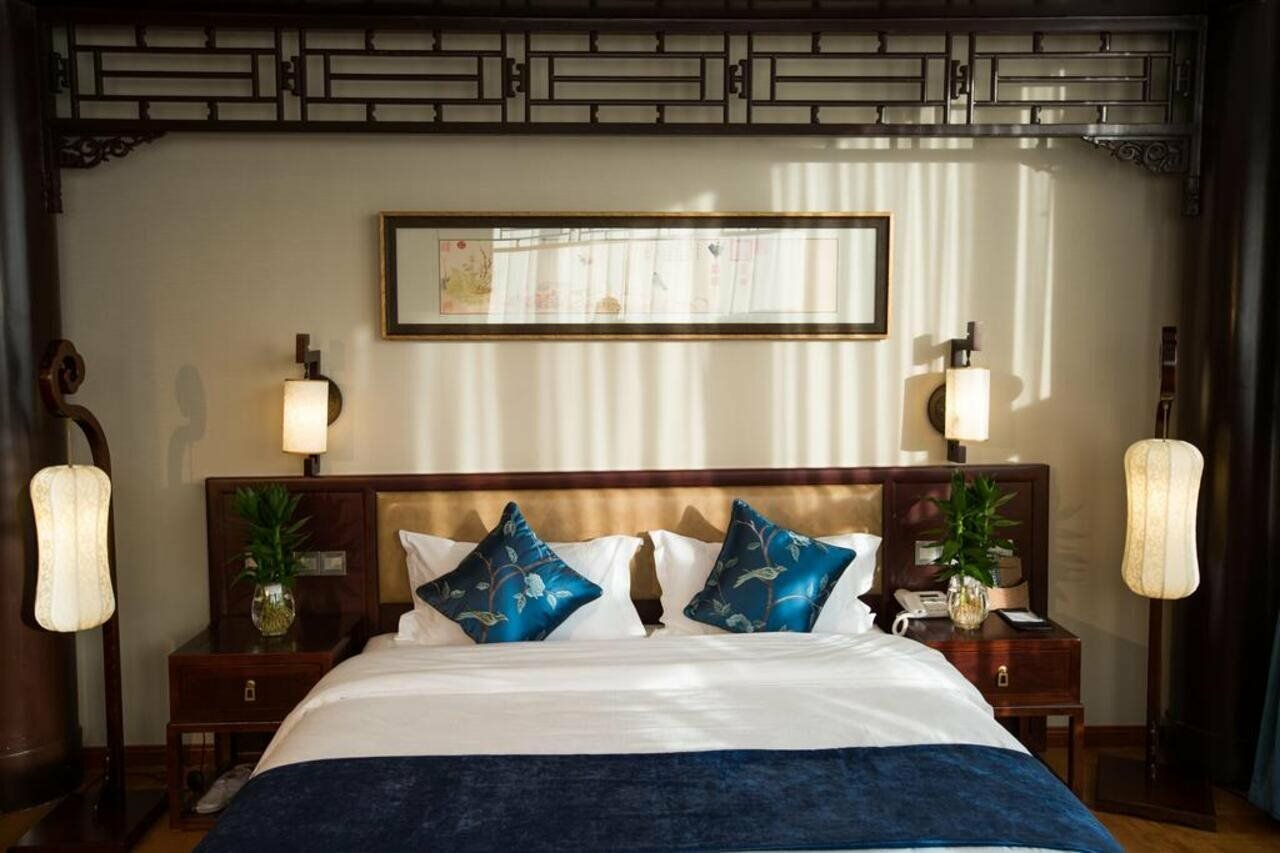 Фото Yitingzhenshe Hotel