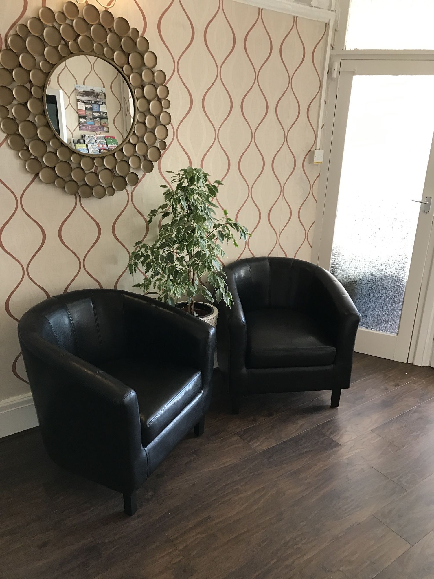 Фото Queens Plaza Hotel