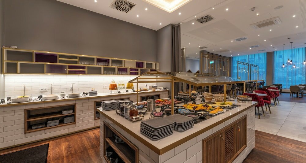 Фото Plaza Premium Muenchen