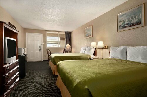 Гостиница Travelodge by Wyndham New Orleans West Harvey Hotel