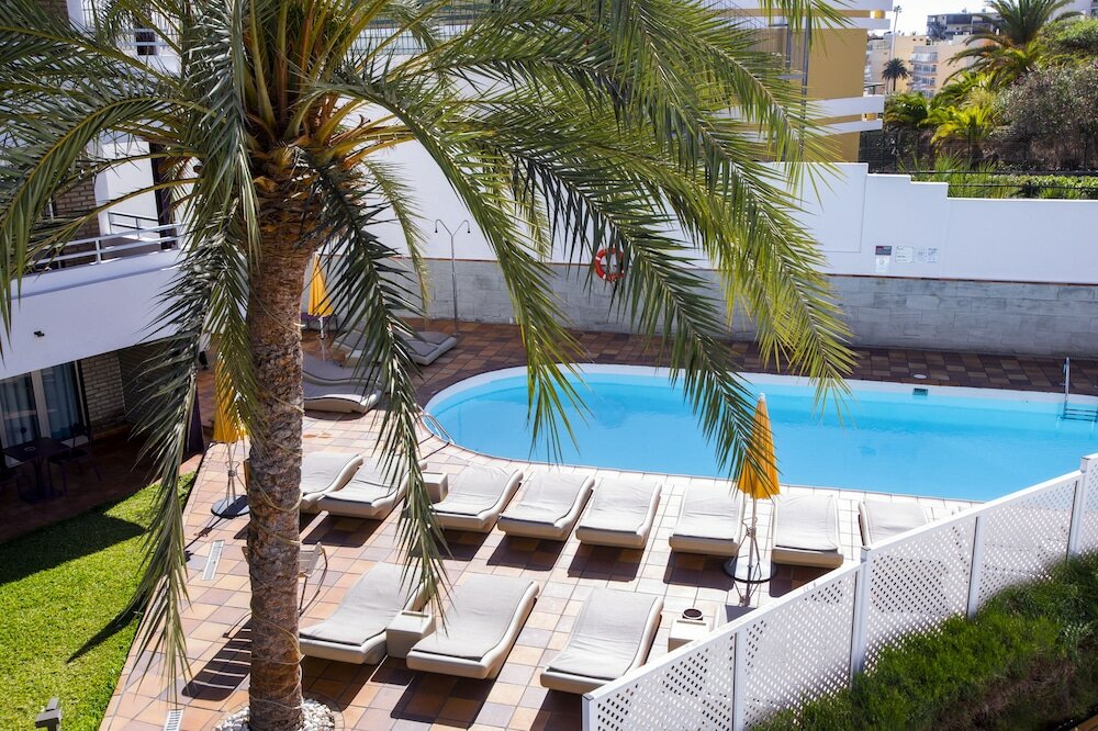 Фото Apartamentos Jacarandas