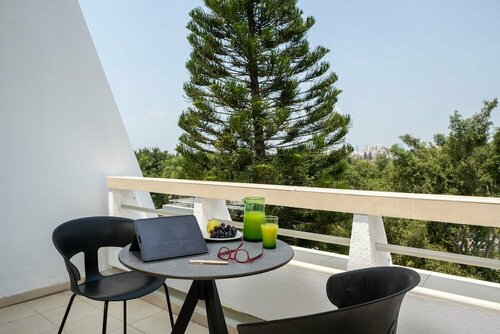 Гостиница Kfar Maccabiah Hotel and Suites в Рамат-Гане