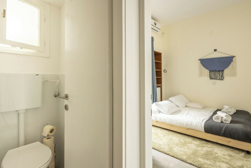 Фото Eclectic Rabin Square Apt by Sea N' Rent