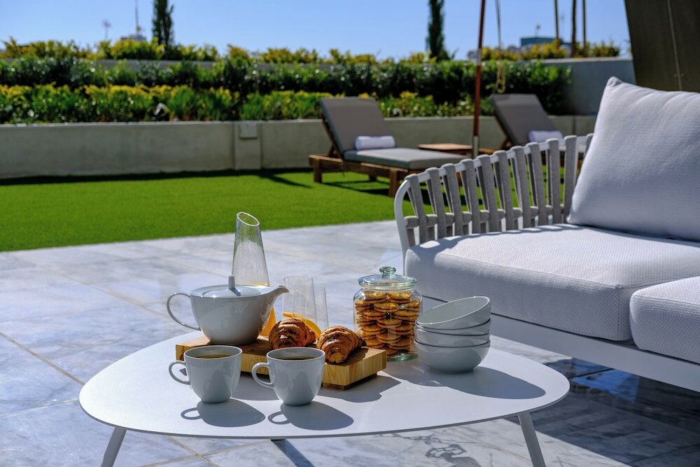 Фото The Icon - Private Apartments