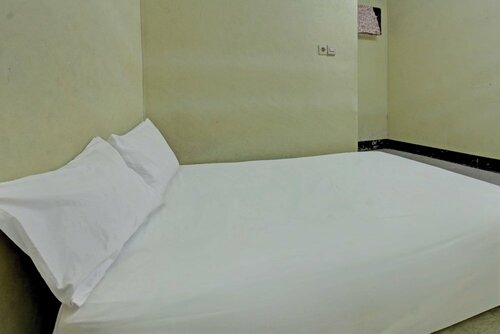 Гостиница Spot On 92882 Penginapan 3 Bersaudara