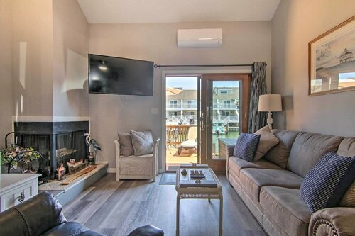 Гостиница Airy Ocean City Condo on Canalfront w Deck!