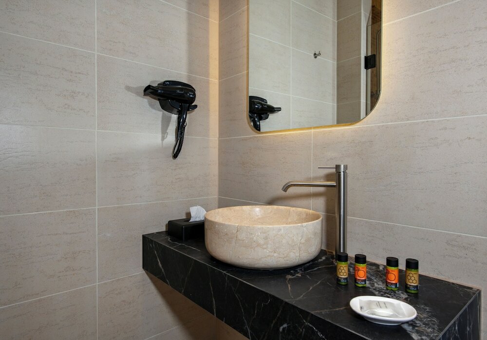 Фото Mosaic Venetian Harbour Suites