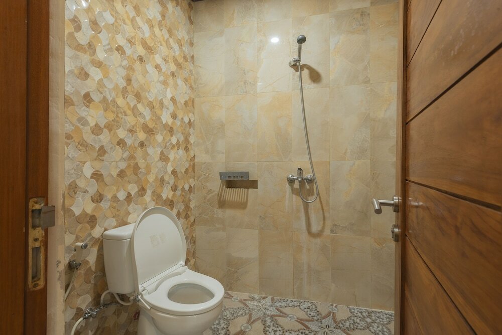 Фото Liliy Guest House Legian