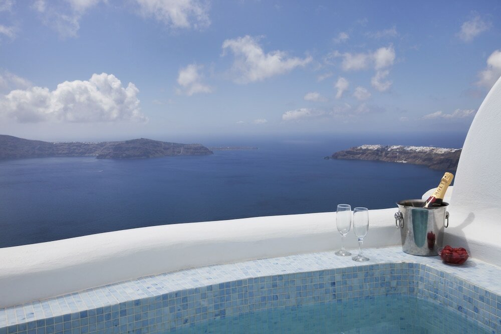 Фото Abyssanto Suites & SPA