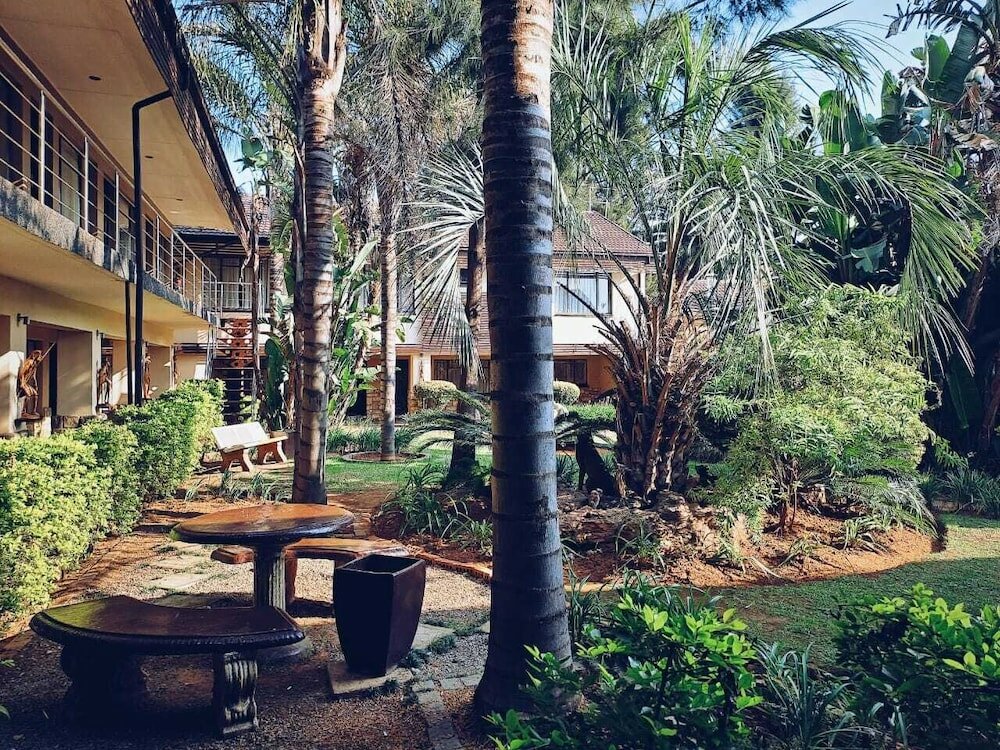 Фото Ecotel Premier Lodge & Conference Centre