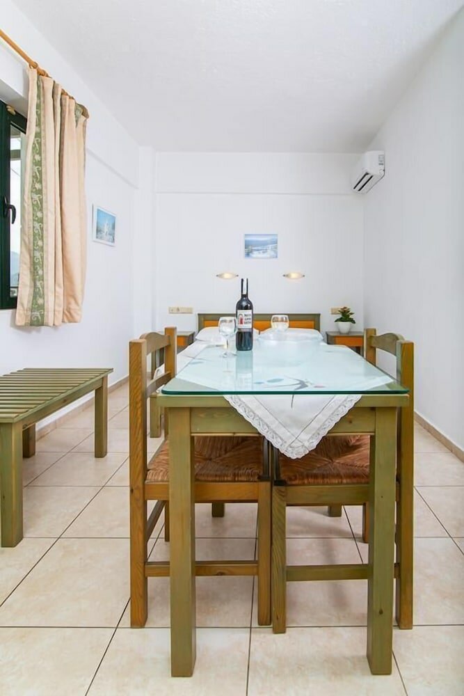 Фото Dionysos Apartments & Studios