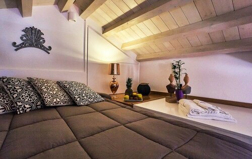 Гостиница Suite&Spa Chambres Du Monde в Кальяри