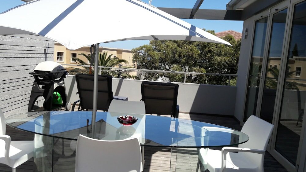 Фото Camps Bay Apartment