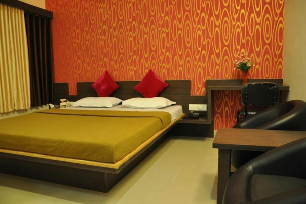 Фото Hotel Om Executive