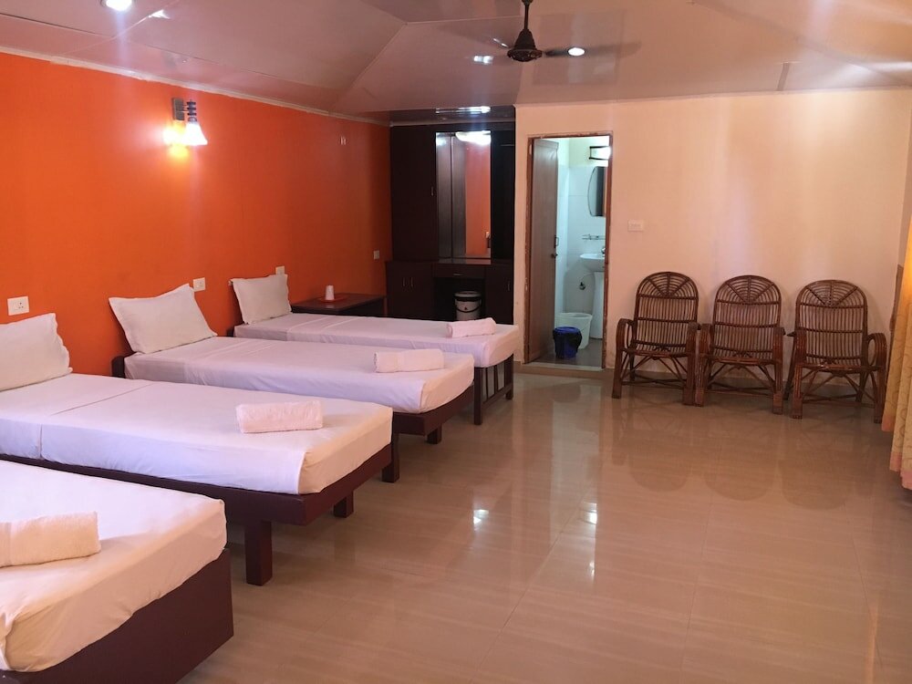 Фото New Kovalam Beach Hotel