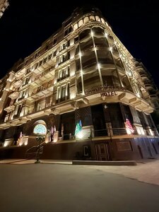 отель Cosmopolitan Plaza Inn Hotel
