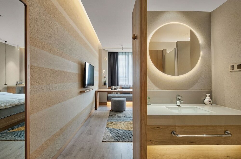 Фото Ebo Hotel Hangzhou Wulinmen