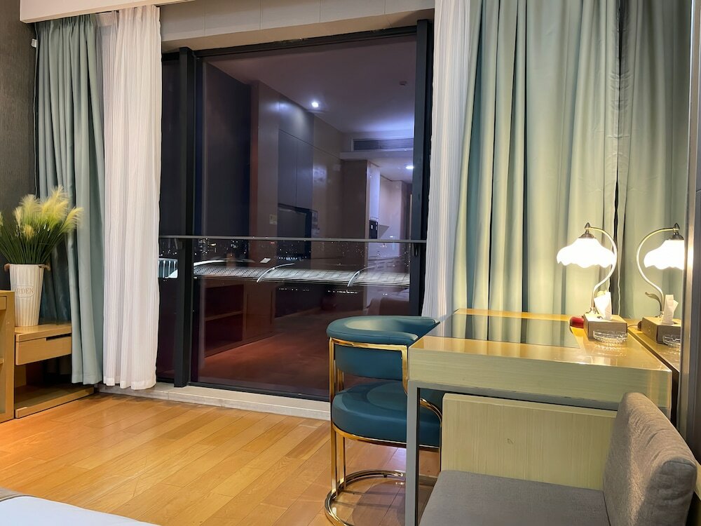 Фото Xingyi International Hotel Poly Store