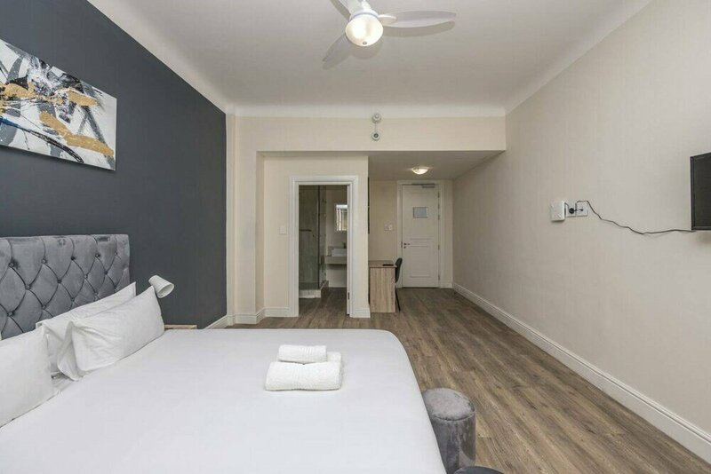 Гостиница Cape Legacy - Stunning Deluxe Studio Suite в Кейптауне