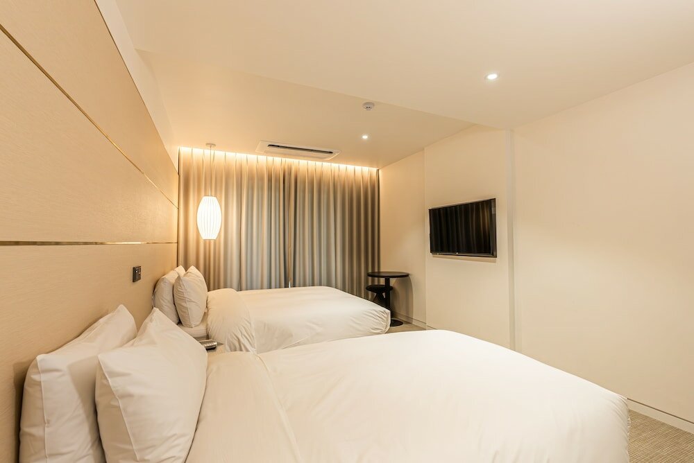 Фото Hotel The Grang Seogwipo