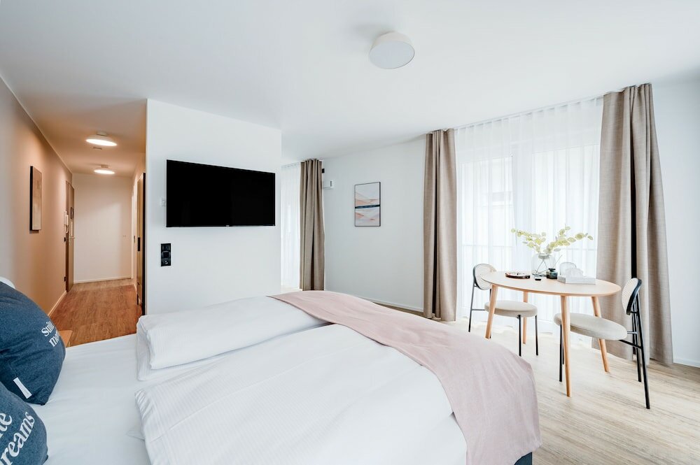 Фото Limehome Metzingen Wilhelmstr